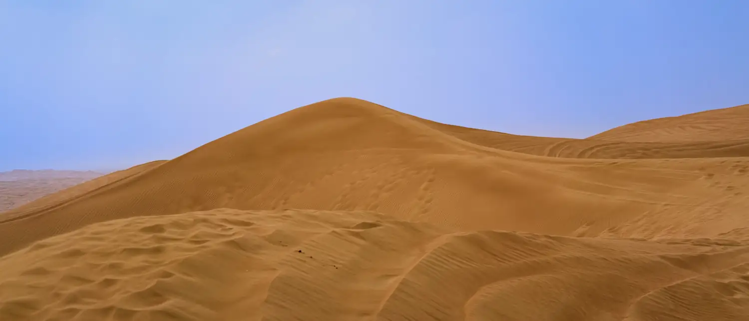 Dunas douradas do deserto da Arábia