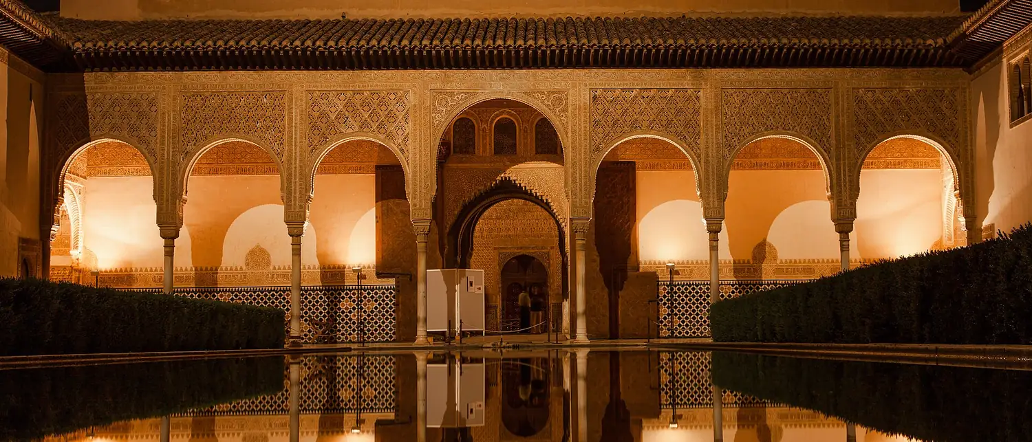 The Court of the Myrtles mirrored in its pool, the Alhambra