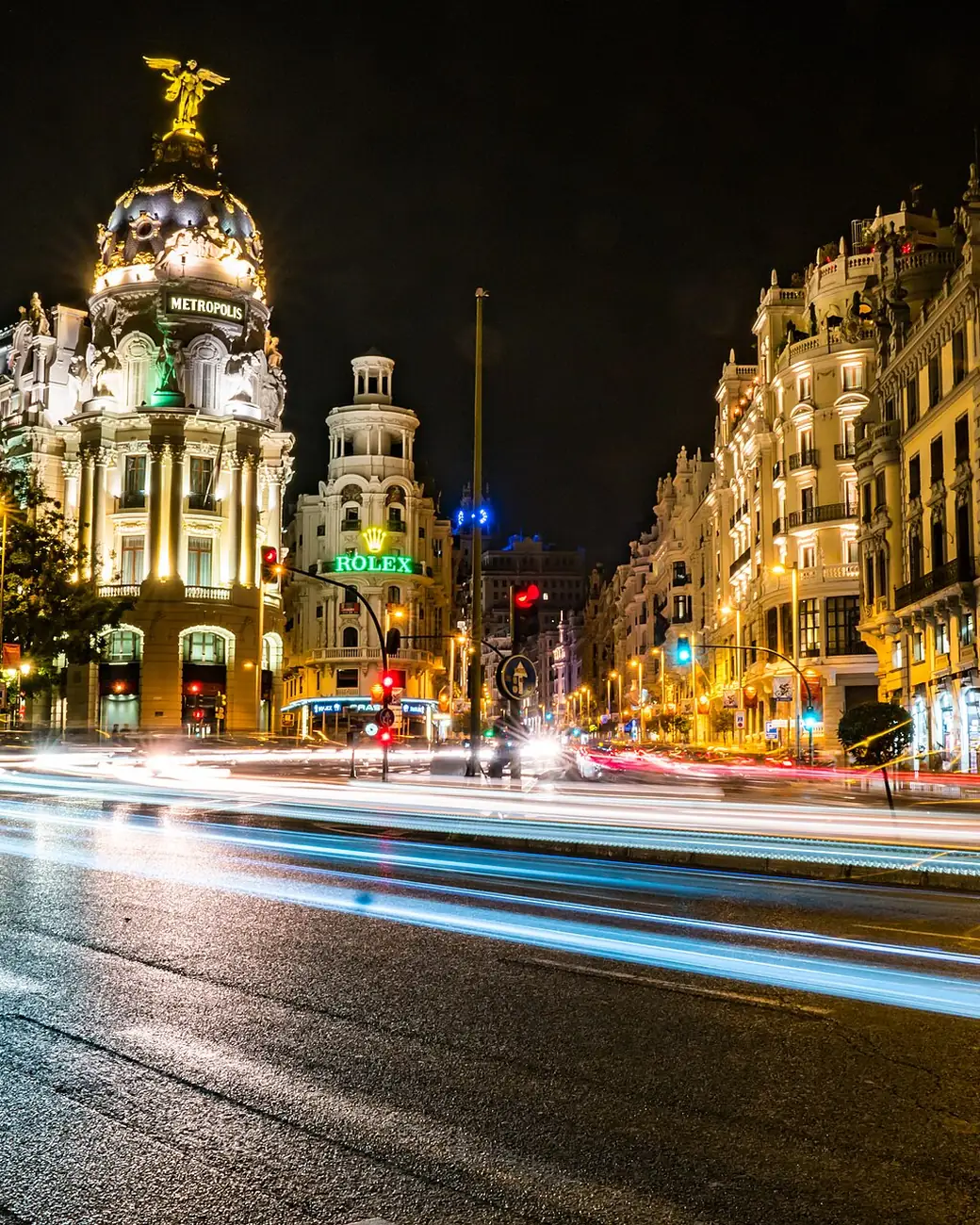 Gran Via in Madrid at night, with the Metropolis building beyond